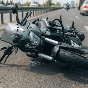 Motorcycle accident scene with damaged bike in New York